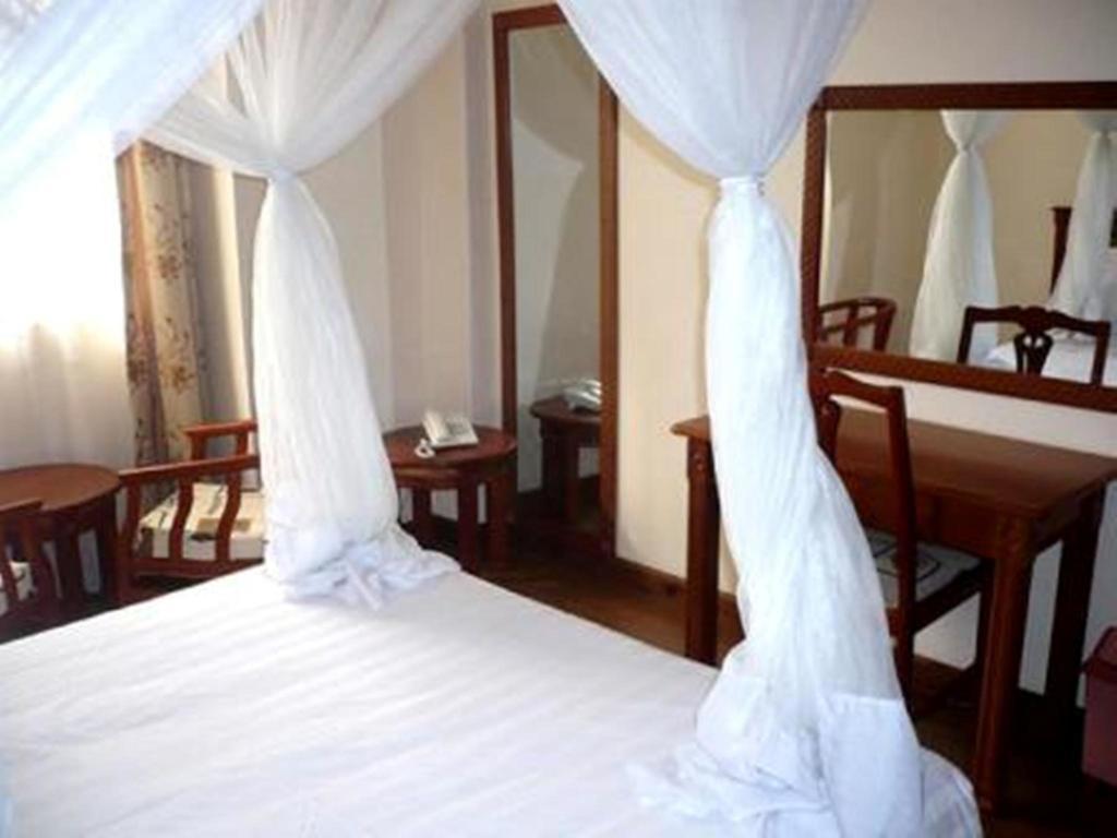 Arusha Tourist Inn Hotel Ruang foto