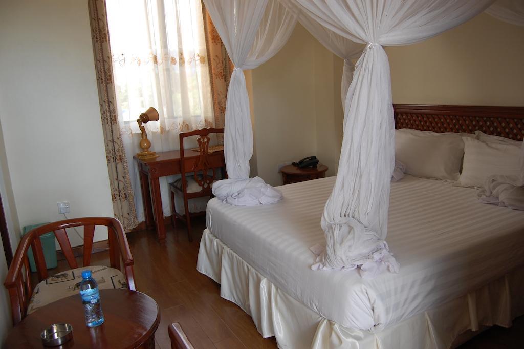 Arusha Tourist Inn Hotel Ruang foto